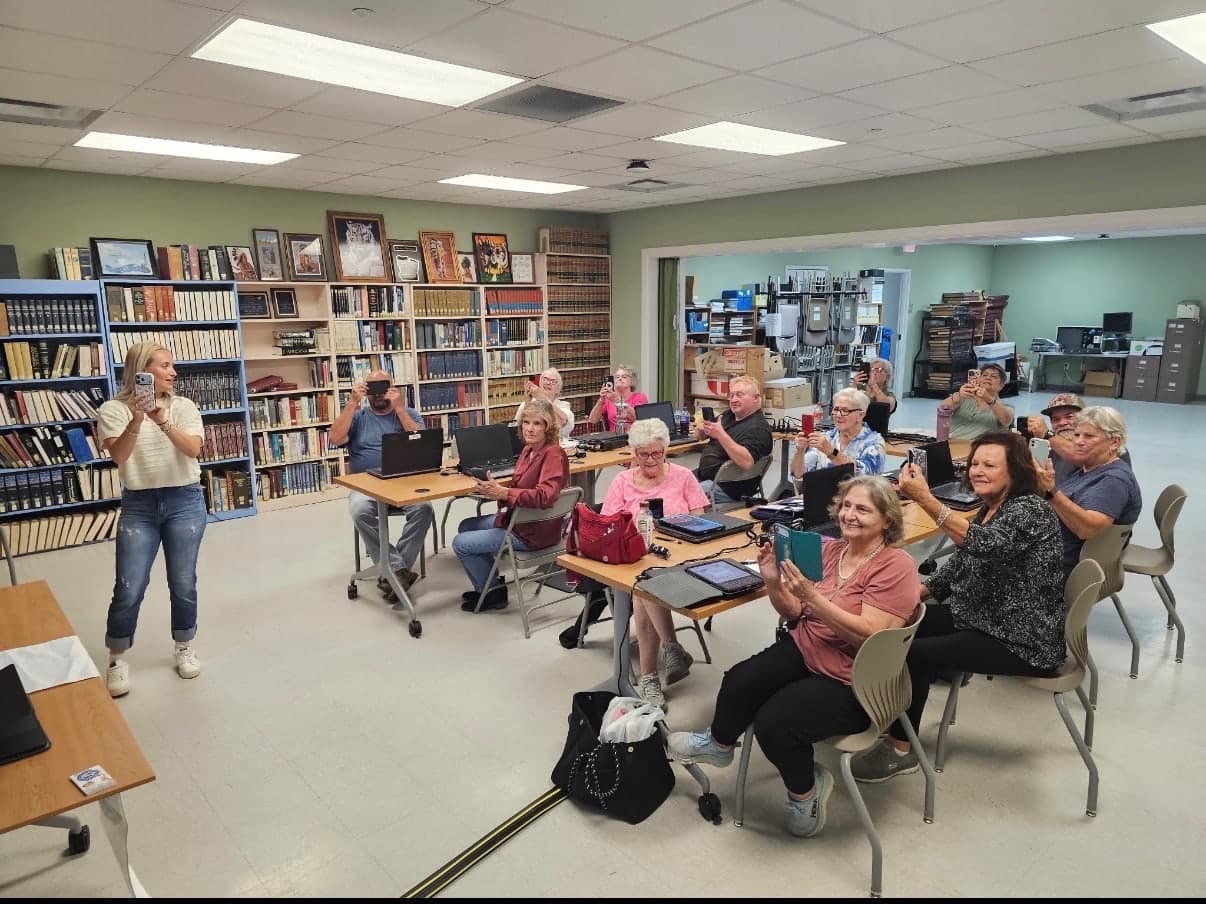 A group learning practical digital skills together