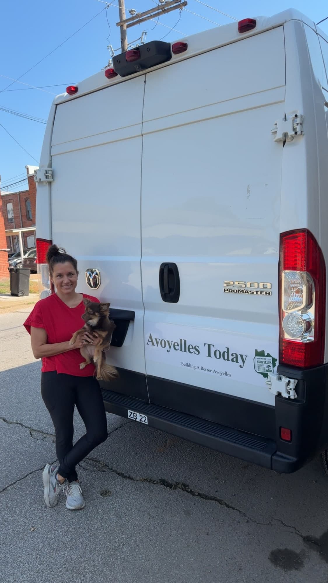 A Building a Better Avoyelles community member beside the Avoyelles Today van